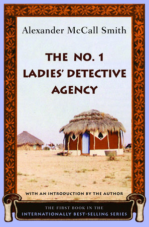 An orange and black floral border frames a photograph of a thatched African cottage on dry scrubby ground. The title and author appears against the pale blue sky. A scroll at the bottom announces that is an international best-selling series.
