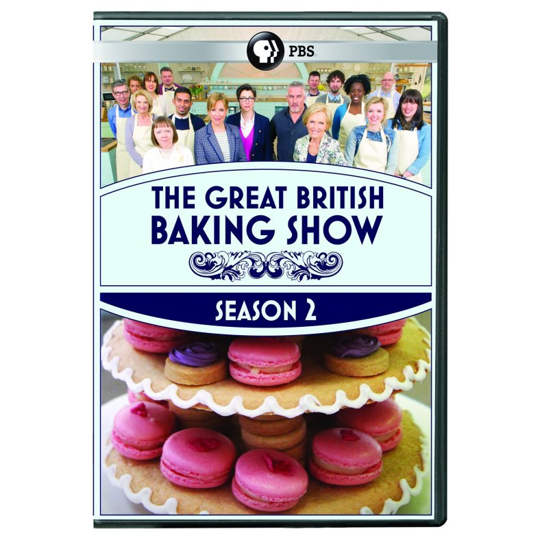 The Great British Baking Show DVD cover, with the contestants and hosts at the top and a tray of macaron cookies below.