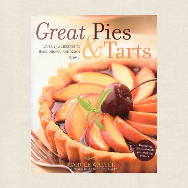 Cover of cookbook features a plum tart with luscious glossy fruit arranged in a swirl on a pastry shell, with a cherry in the middle.