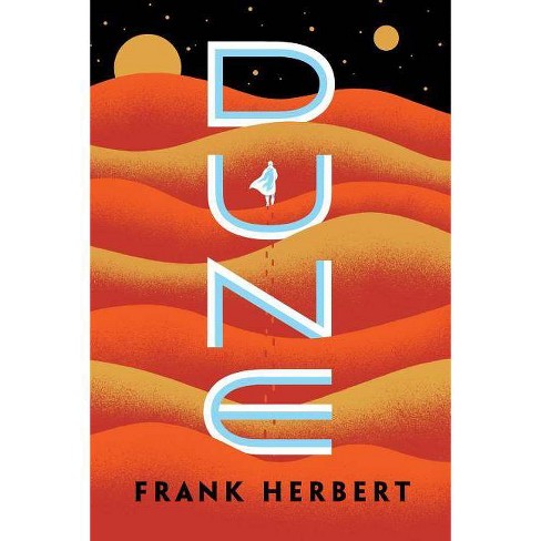 Orange and yellow waves of color suggest sand dunes. Title appears in bright white type vertically in the center, with a silhouetted figure within the "U". A black space sky is across the top, with stars and moons.