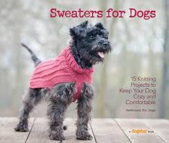 The book cover photograph depicts a dark grey terrier wearing a knitted pink sweater.