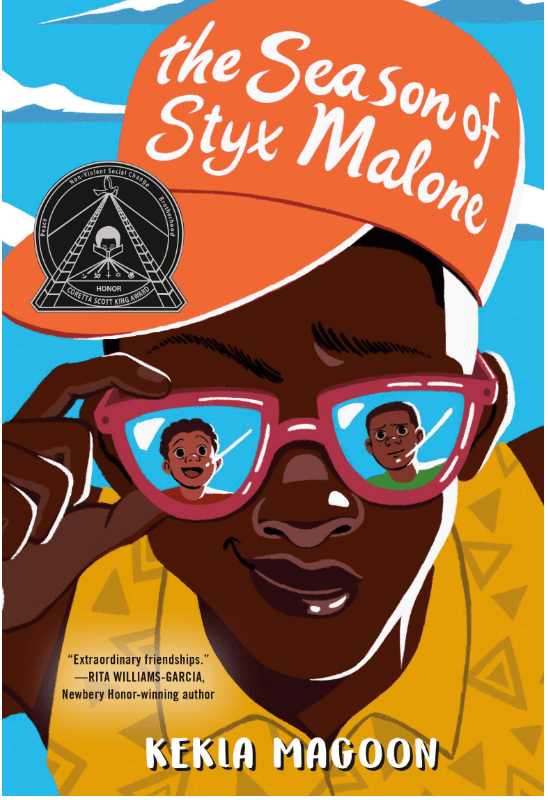 Cover art has an illustration of a Black teenager in a slightly off-center ball cap, adjusting his mirrored sunglasses. In the glasses, you can see two other Black kids. The title of the book appear in script on the orange hat.