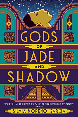 A colorful cover full of jade green, deep purple, and gold features the profile of a young Mexican woman gazing at the starys. The panels are decorated with Mayan symbols, including a double headed snake, a caiman, and a skull.