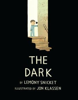 The cover of The Dark shows a small child dressed in blue, looking through an open door down a set of brown wooden stairs into a basement. The child looks apprehensive and only the first three stairs and part of the stair railing are illuminated; the rest of the basement is in the dark.