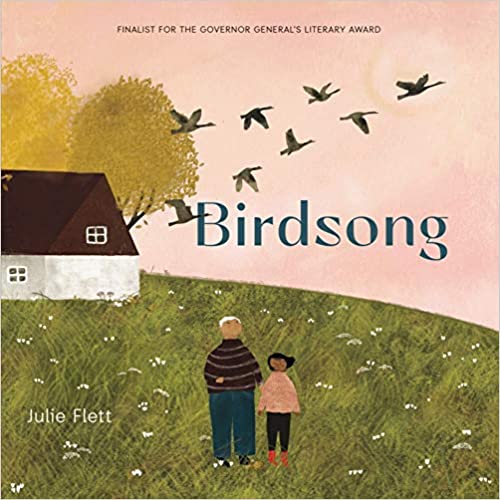 The book cover depicts a man and a girl in the foreground, on a green grassy hill, with a white house with a brown roof, trees with yellow-green foliage, and geese in formation in the sky in the background.