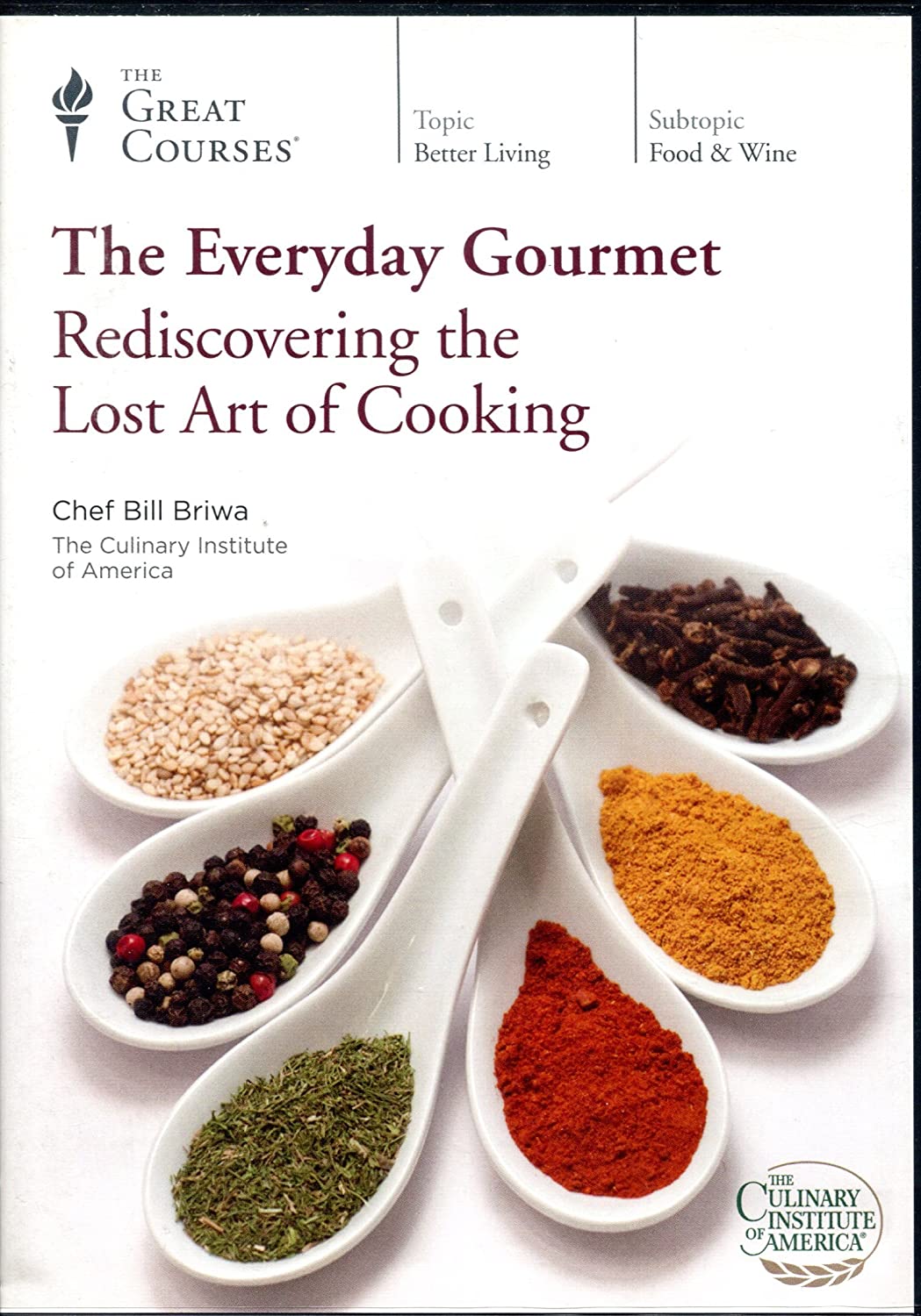 A white cover features white flat soup spoons, each filled with a different color spice.