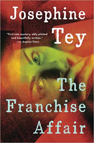 The book cover depicts the headshot of a woman, lying on her side and staring at the viewer, with her fingers to her mouth. Her eyes are wide with long lashes and carefully manicured brows.