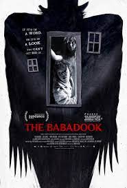 The movie poster depicts a silhouette of the Babadook surrounding an open door and two windows, as if the Babadook is the house containing them. Viewed through the open door are two children, one perched above the other, both looking out as if into the dark.