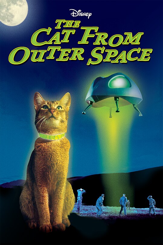 An orange marmalade cat sits in the foreground, wearing a glowing green collar, while in the background a spaceship hovers above a group of seemingly confused people.