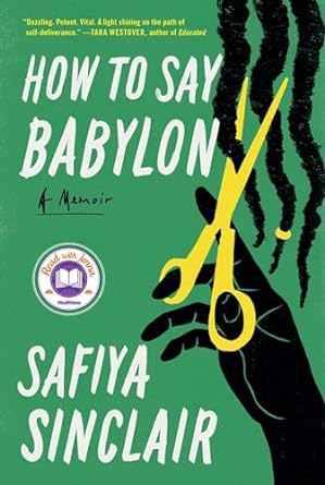 The cover shows a hand holding a pair of yellow scissors and cutting three dreadlocks that are dangling from above; one has a yellow bead at the end.