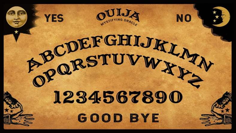 Ouija Board with a curved alphabet, numbers 1 through 0, a moon and yes in the upper right corner, and a moon and no in the upper left.