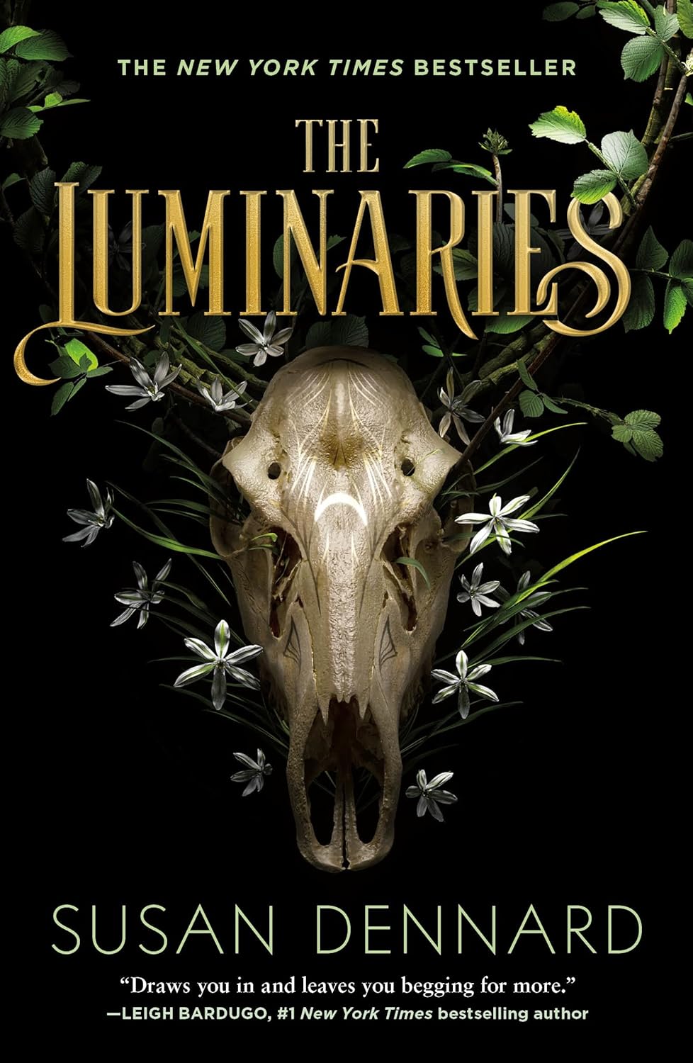 The book cover depicts a fanciful skull surrounded by flowers.